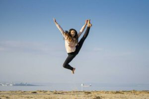 woman who is dancing for exercise so she can stay fit